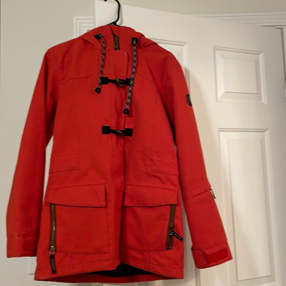 Bright red Ski/snowboard jacket by ride snowboards